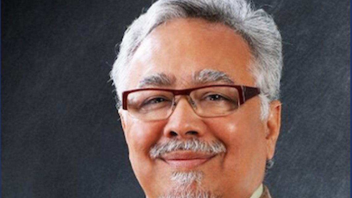 Prajensit Duara head shot in suit