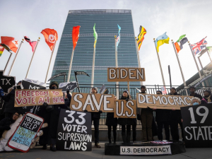 protestors holding signs