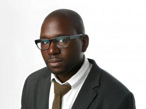 Man in glasses, tie & coat