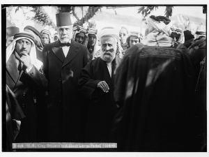 H.M. King Hussein and Musa Kazim Pasha surrounded by others