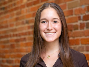 smiling woman with brown hair