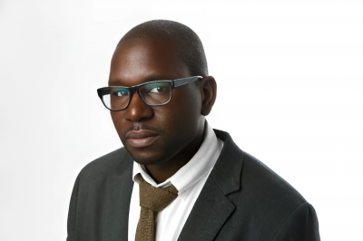 Man in glasses, tie & coat